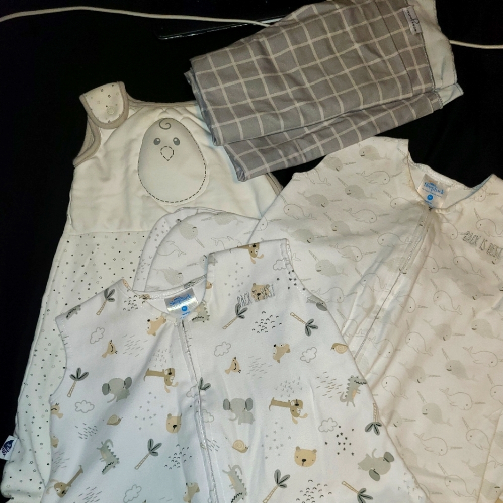 3 sleep sacks, 1 swaddle